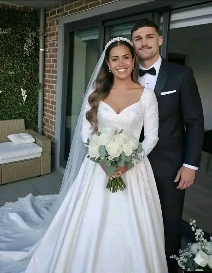 In a dazzling celebration that stopped the nation, Australian sporting royalty Nathan Cleary and Mary Fowler have officially tied the knot — uniting two of the country’s most beloved athletes in a love story that feels straight out of a fairytale. The announcement of their wedding sent social media into overdrive, with fans, teammates, and celebrities showering the couple with tributes and heartfelt messages. From Penrith to Manchester, from the NRL to the Matildas, the worlds of rugby league and football united in one joyous chorus: “Congratulations to the golden couple!”  The ceremony itself, held in a picturesque coastal venue, reflected the personalities of both stars — elegant, understated, yet filled with warmth and authenticity. Guests described the event as “magical” and “beautifully simple,” blending traditional elements with personal touches that spoke volumes about the couple’s bond. Mary Fowler, radiant in a custom-designed gown that perfectly balanced modern grace and classic sophistication, stunned onlookers as she walked down the aisle. Nathan Cleary, dapper in a tailored suit, was visibly emotional as he saw his bride — his lifelong teammate — approach.  For fans who have followed their journey, this wedding feels like a culmination of two parallel success stories that have now beautifully intertwined. Nathan Cleary, the Penrith Panthers halfback and one of rugby league’s most accomplished players, has built a reputation as a fierce competitor with a calm, composed leadership style. His discipline, humility, and consistency have made him a cornerstone of Australian sport. Mary Fowler, meanwhile, has blossomed into one of the brightest young stars in women’s football, dazzling global audiences with her flair, vision, and humility both on and off the pitch.  Their relationship — first rumoured months before being confirmed publicly — quickly became one of the most talked-about love stories in Australian sport. Fans admired how naturally their connection developed, rooted not in glamour or publicity but in shared values, respect, and a deep understanding of the pressures that come with sporting fame. Both Cleary and Fowler have always placed family and personal growth above headlines, and that same sense of groundedness was at the heart of their wedding celebration.  The guest list was a who’s who of Australian sport: Penrith teammates, Matildas stars, and high-profile figures from across the codes came together in what some described as “a once-in-a-generation sporting gathering.” Yet despite the star power in attendance, the couple kept the focus firmly on love, gratitude, and togetherness. A live acoustic band played as the newlyweds shared their first dance under a canopy of twinkling lights — a simple, tender moment that perfectly captured their relationship.  As the sun set over the ocean and fireworks lit up the night sky, one thing was clear: this was more than just a wedding — it was the celebration of a partnership built on mutual respect, balance, and genuine affection. In a world where fame often tests relationships, Nathan Cleary and Mary Fowler’s union stands as a powerful reminder that even under the brightest spotlight, true love shines the brightest.  Australia has a new power couple — not because of their fame, but because of their heart. 💍❤️In a dazzling union that has captured hearts across Australia, sports icons Nathan Cleary and Mary Fowler have officially become husband and wife. The golden couple, celebrated for their achievements on the field and their endearing public presence, exchanged vows in a ceremony that was as elegant as it was heartfelt…..read more  https://sportactivities.co.uk/1857-2/